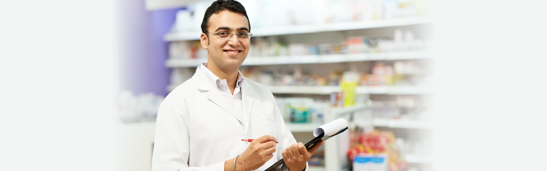 woman standing in pharmacy drugstore