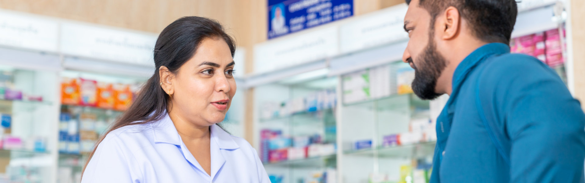 woman pharmacist medication recommendation about medicine